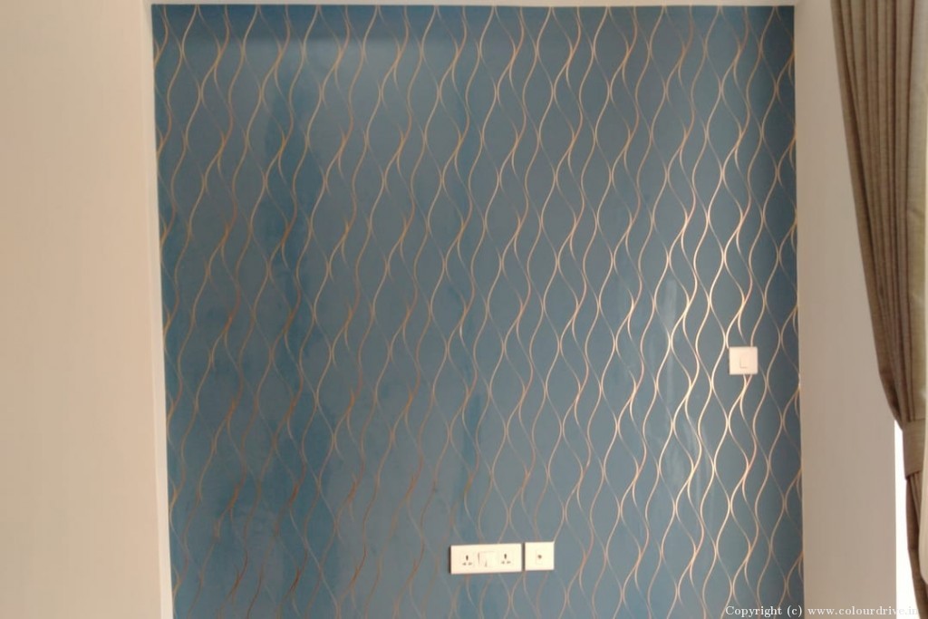 stencil design on Blue wall Rich Look Stencil Design Stencil Painting for Living Room